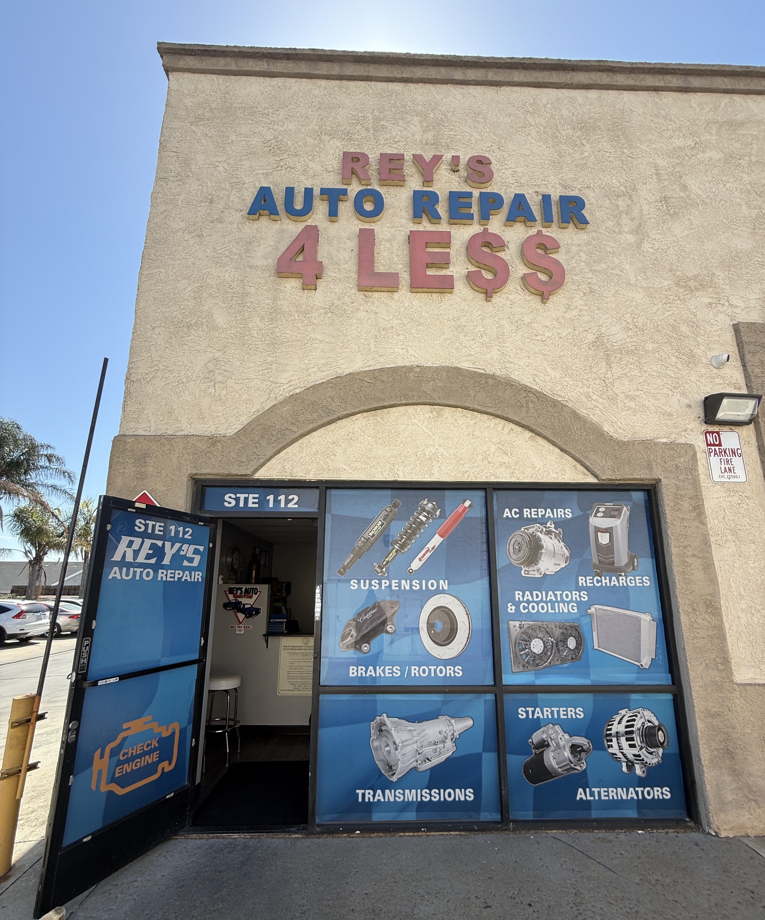 Rey's Auto Repair 4 Less storefront in Corona, CA